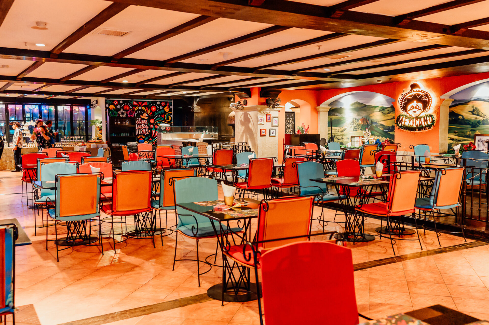 Outdoor dining at Mexicano restaurant in Bangkok with poolside setting and authentic atmosphere