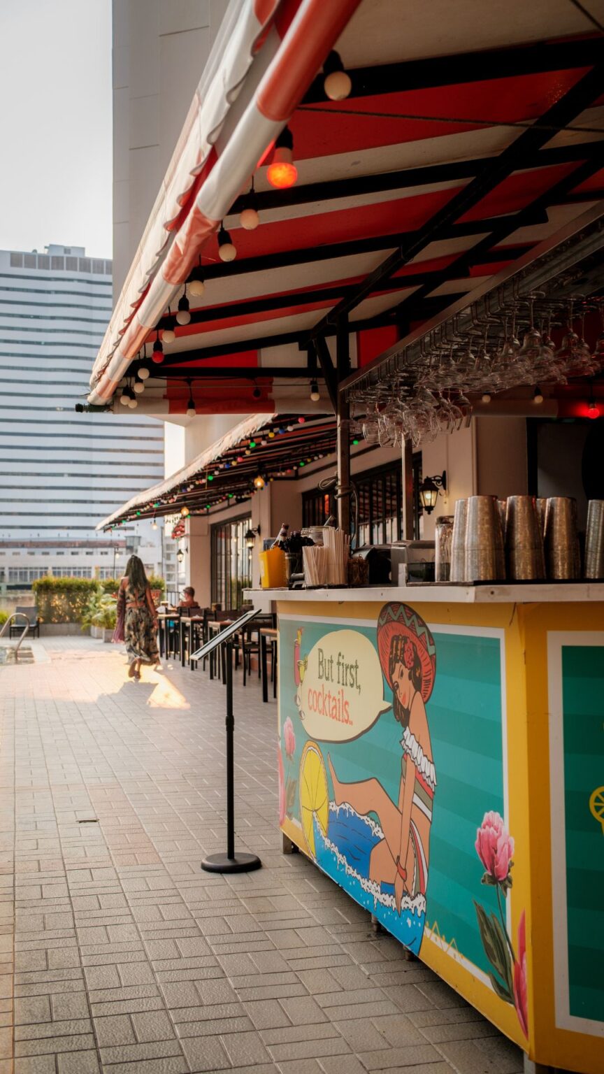 Pool bar serving cocktails beside swimming pool in Bangkok hotel